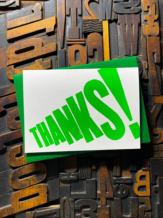 Thanks! A vibrant thank you typographic letterpress card with deep impression print using fluorescent green, with a range of colourful envelopes. Slight print variations adding to the style anding to the charm of this handmade greeting card.