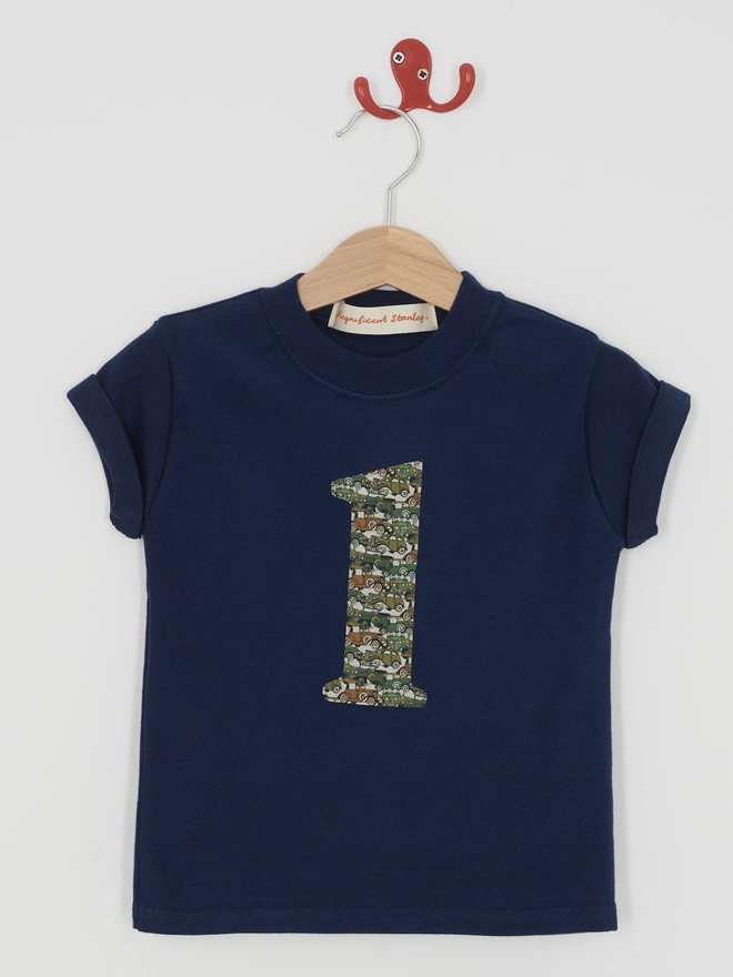 A navy cotton t-shirt with a number in vintage car print sewn on the front