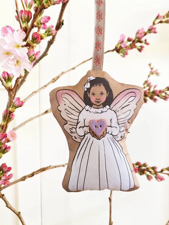 pretty lavender fairy hanging decoration holding lilac heart button