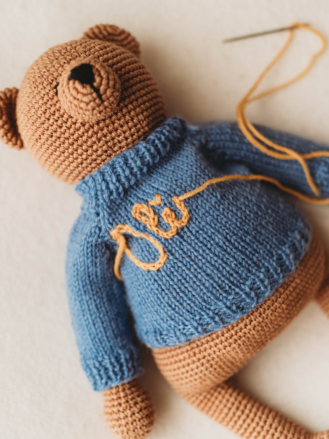 hand crochet brown teddy bear with hand knit blue personalised jumper