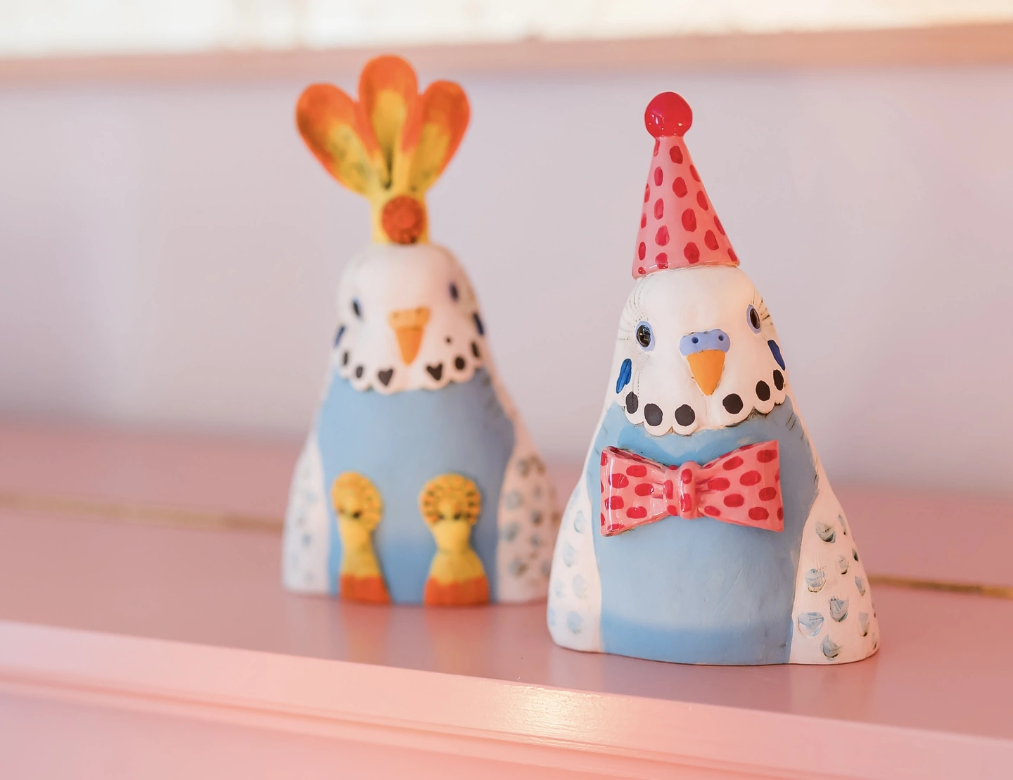 Ceramic budgie sculptures 