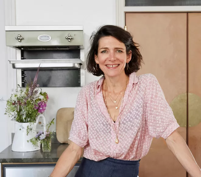 Thomasina Miers, founder of Wahaca, smiling at the camera in a pink blouse.