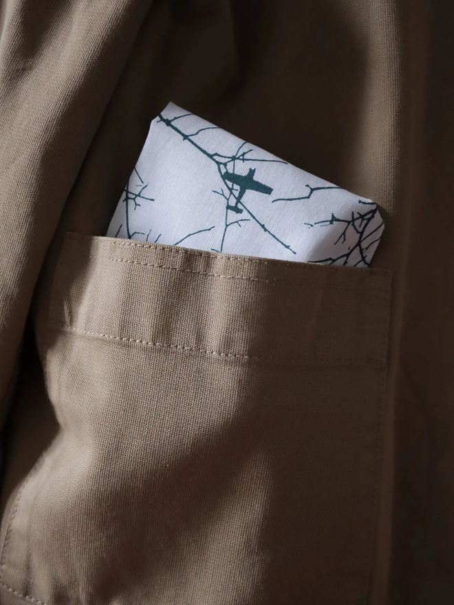 Mr.PS Flying High Aeroplane handkerchief folded in a stone coloured jacket pocket