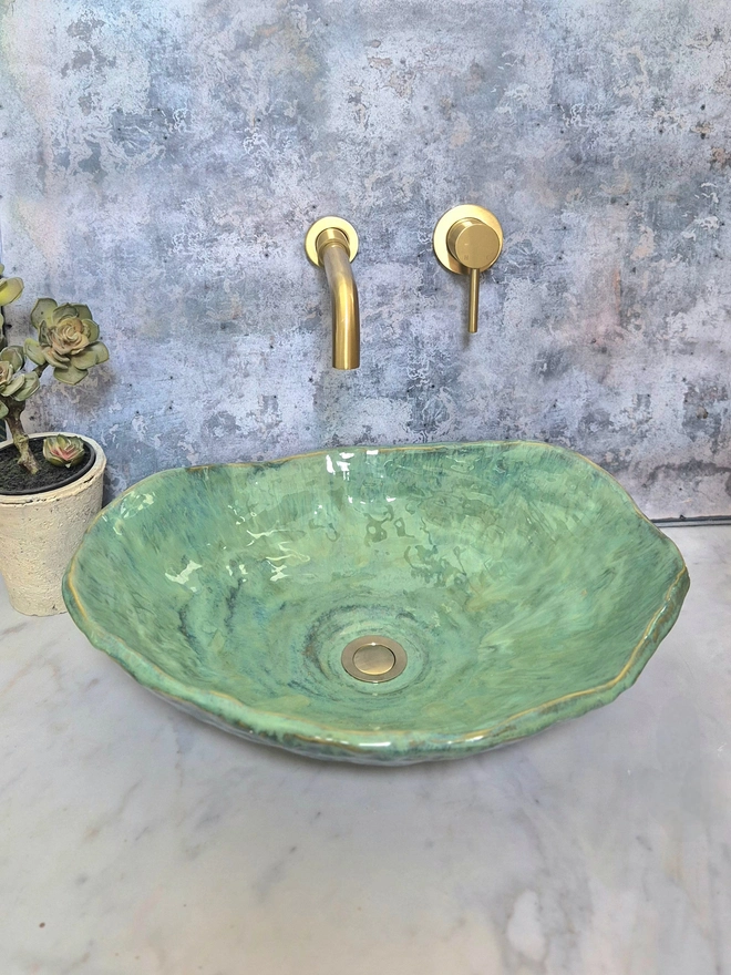 Green Ceramic Bathroom Basin, ensuite, WC, Sink, Crafted from stoneware clay, bathroom edit, bathroom furniture, bathroom decor, gold taps, floral wallpaper, homeware, Jenny Hopps Pottery, J.Hopps Pottery, J.H Pottery