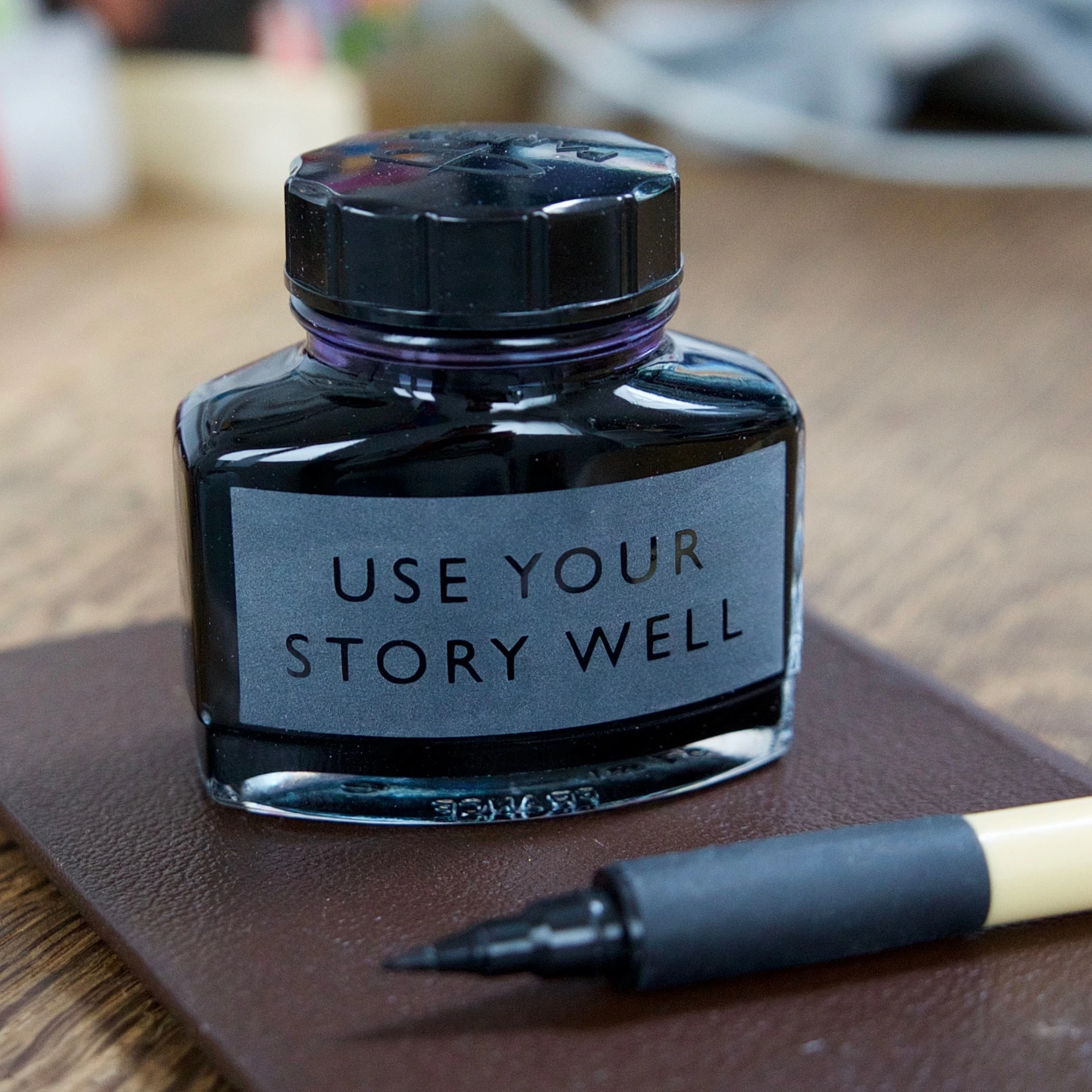 Ink pot by Vinegar & Brown Paper that says 'use your story well' 