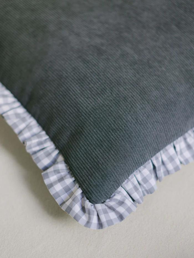 grey corduroy and gingham dog bed corner