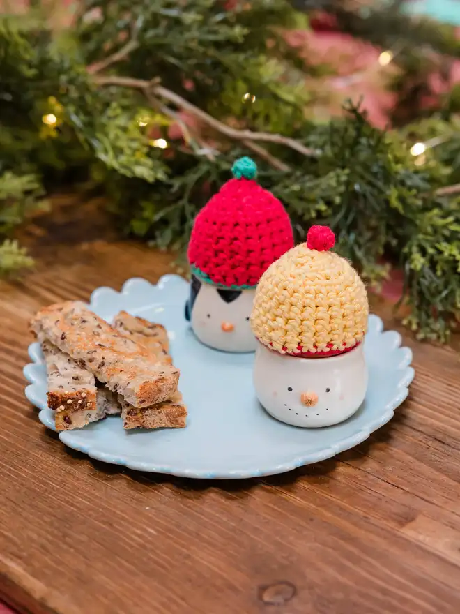 Penguin and snowman egg cups