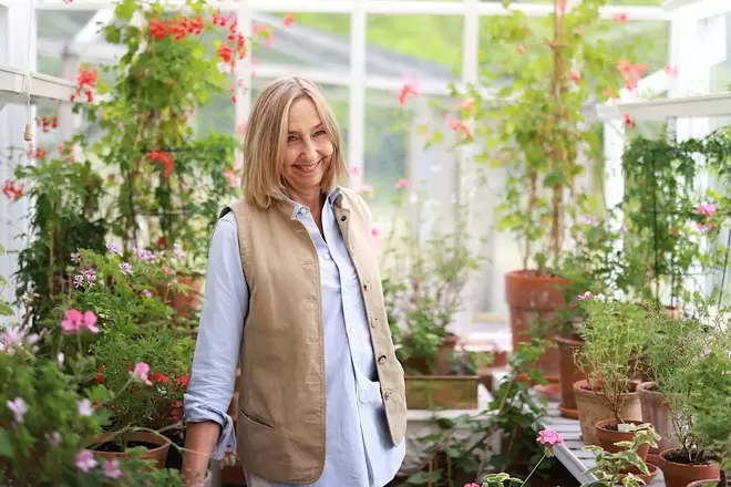 Cath Kidston Padgham MBE in her greenhouse