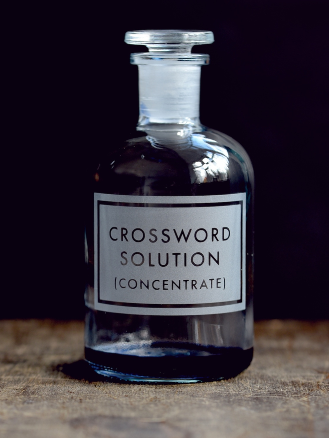 Crossword solution glass apothecary bottle