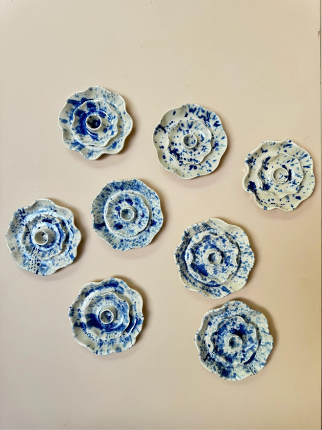 blue and white splattered ceramic candle holders