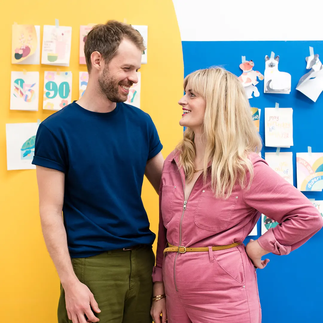 Husband and wife team Rebecca and Mark founders of Raspberry Blossom in their colourful warehouse studio