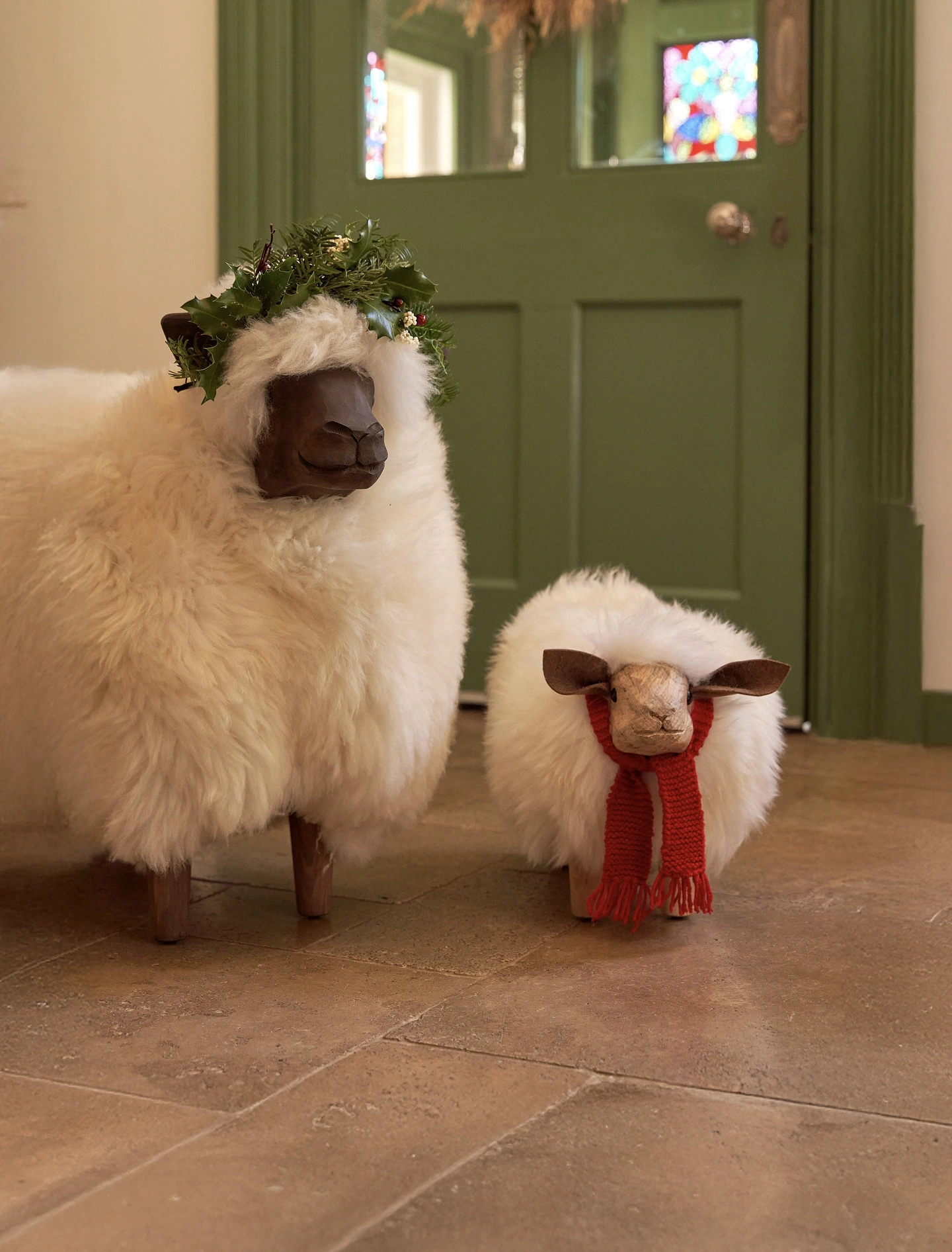 Sheep footstools winter home