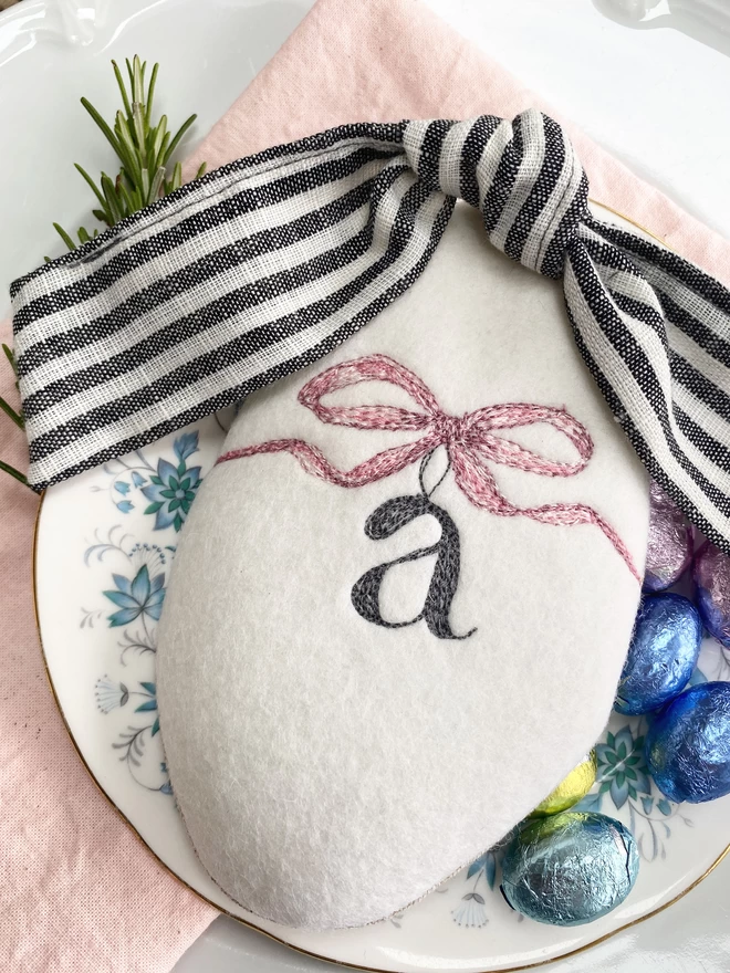 Embroidered Easter Egg Pouch with a bow and initial