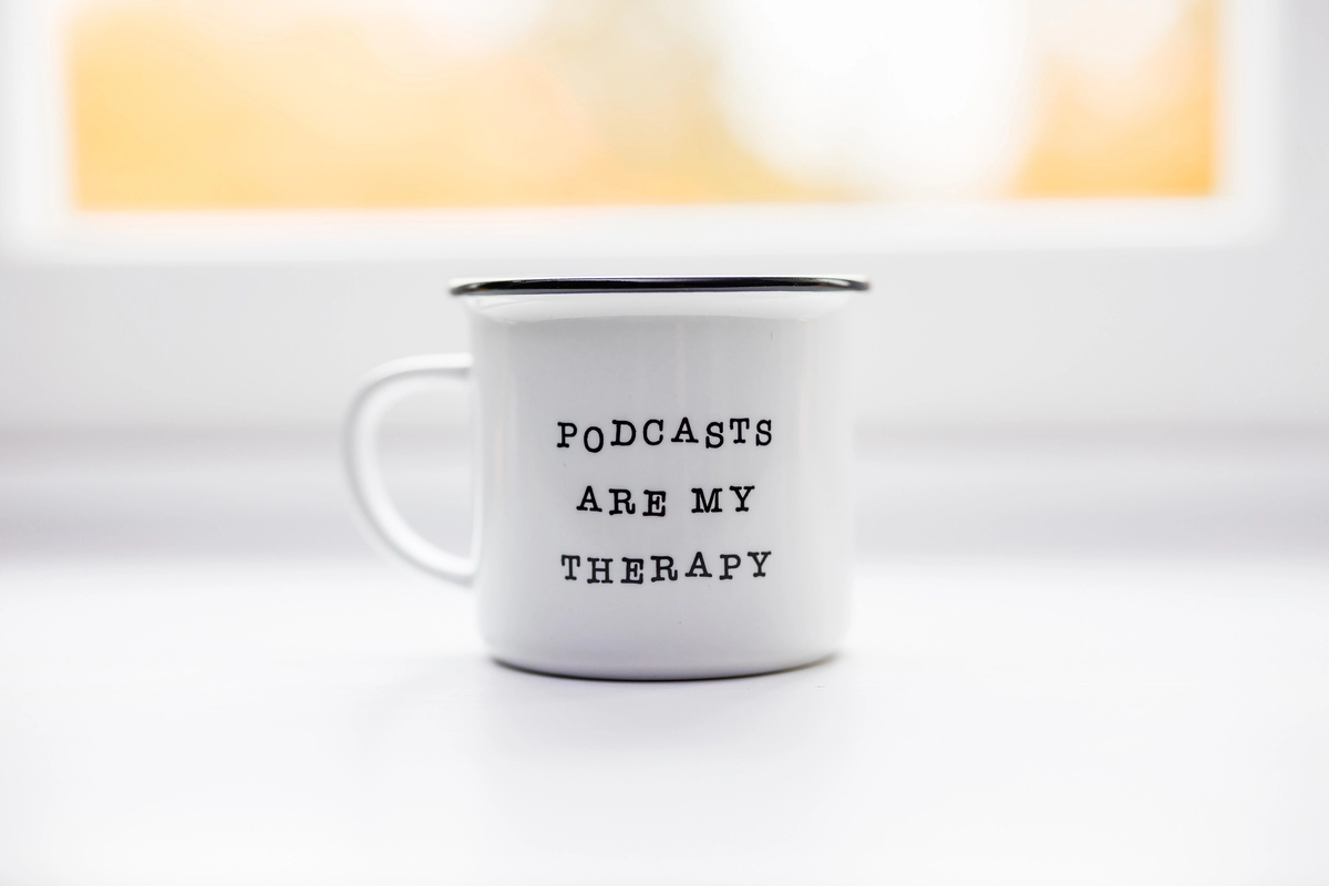 Mug that says 'podcasts are my therapy'