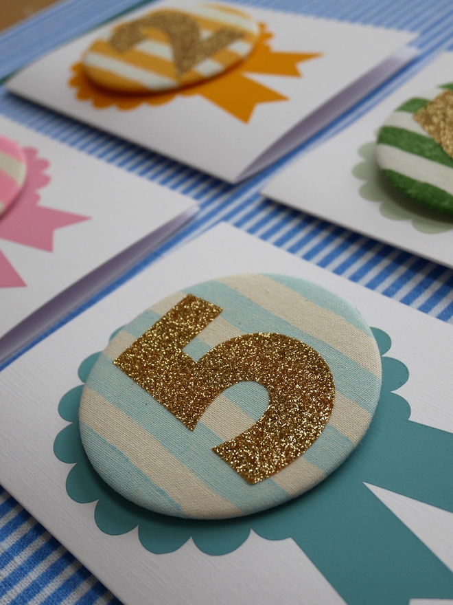number 5 birthday badge and card in blue