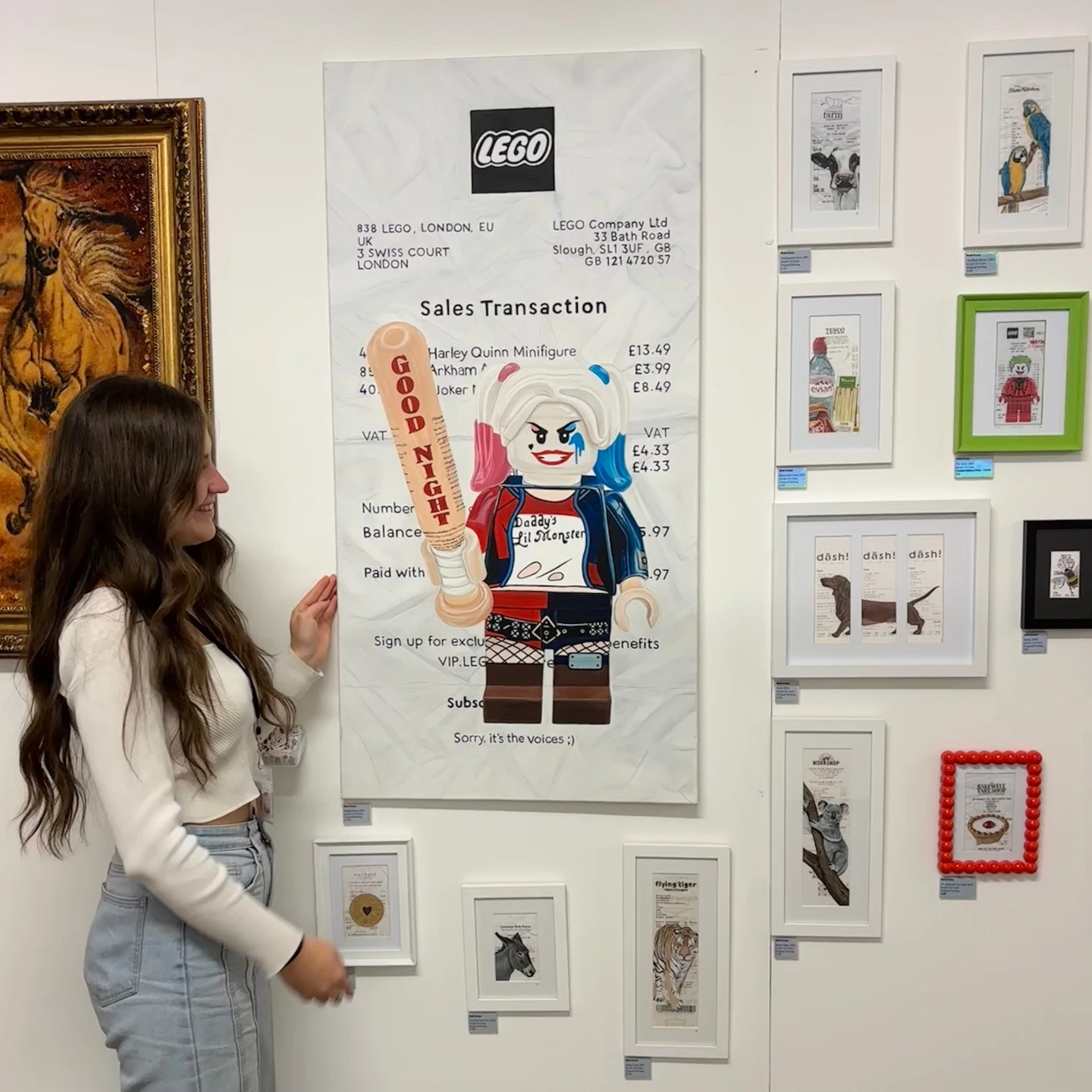 beth standing with some of her art