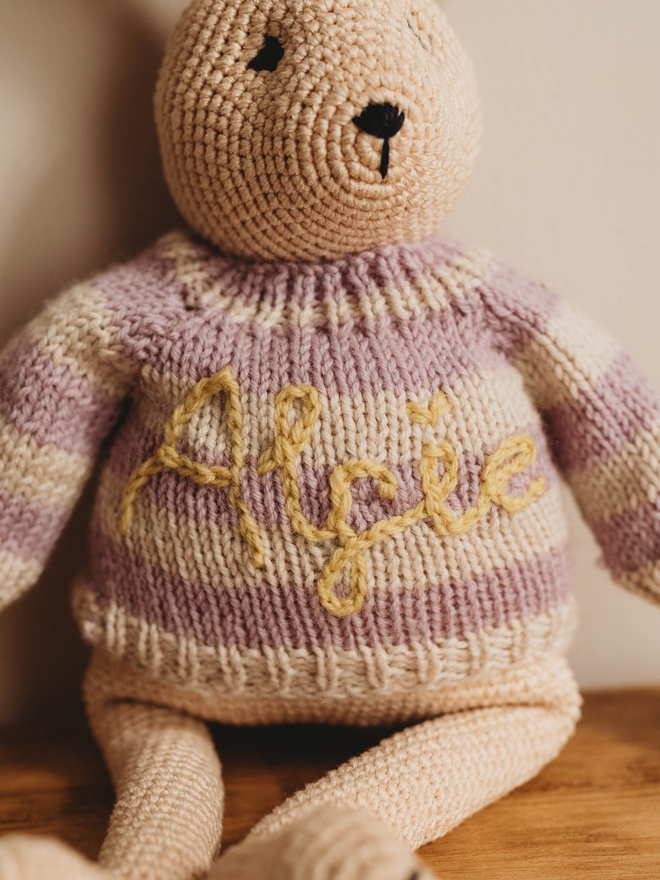 hand crochet bunny with hand knit purple and white striped personalised jumper