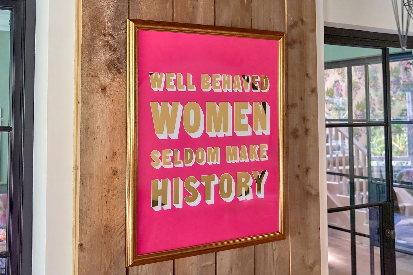 Well behaved women seldom make history sign