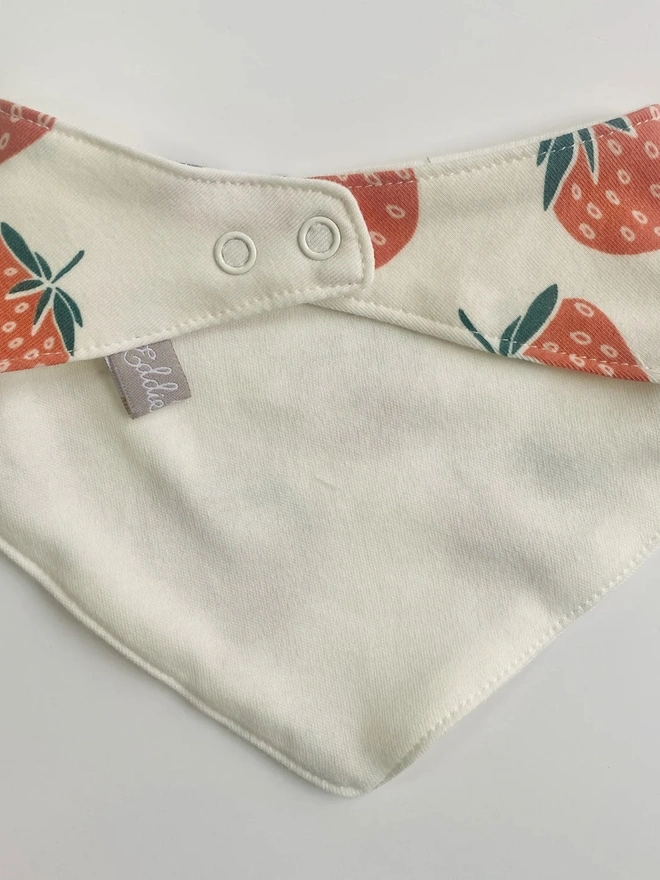 Organic Cotton Baby Dribble Bib in Cream "Strawberry" Print