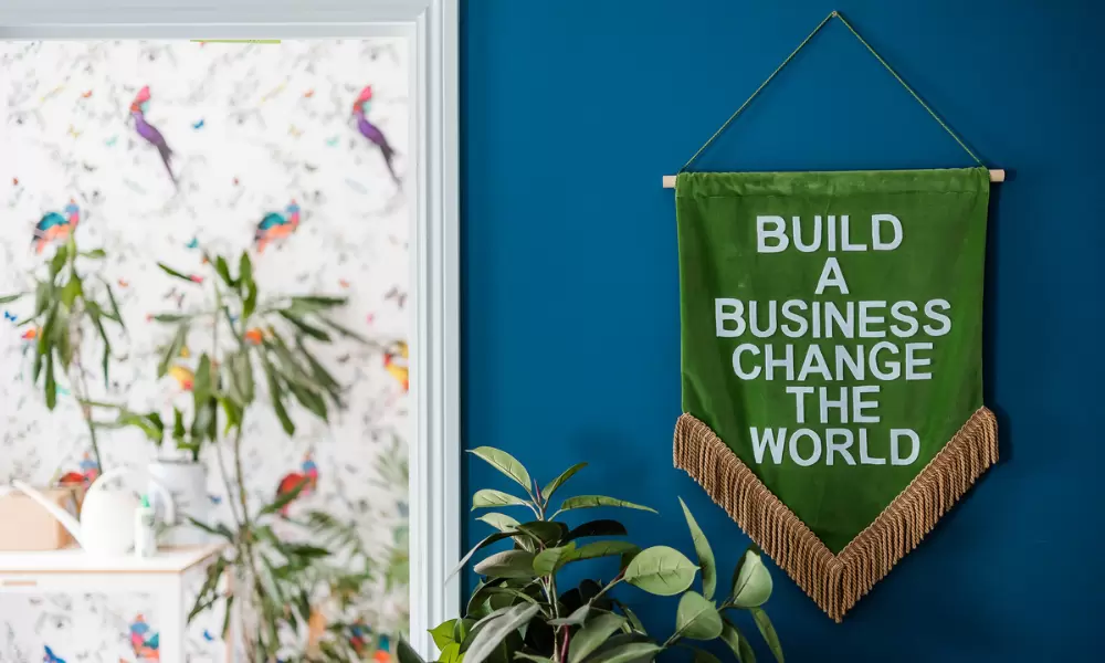 'Build a business, change the world' banner