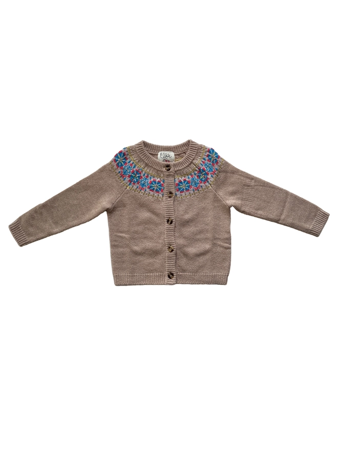 A beige cardigan with a fair isle patterned yoke with blue and orange highlights