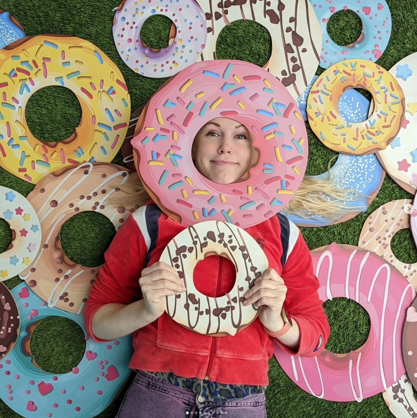 Founder of the Prop Factory seen surrounded by fake do-noughts.