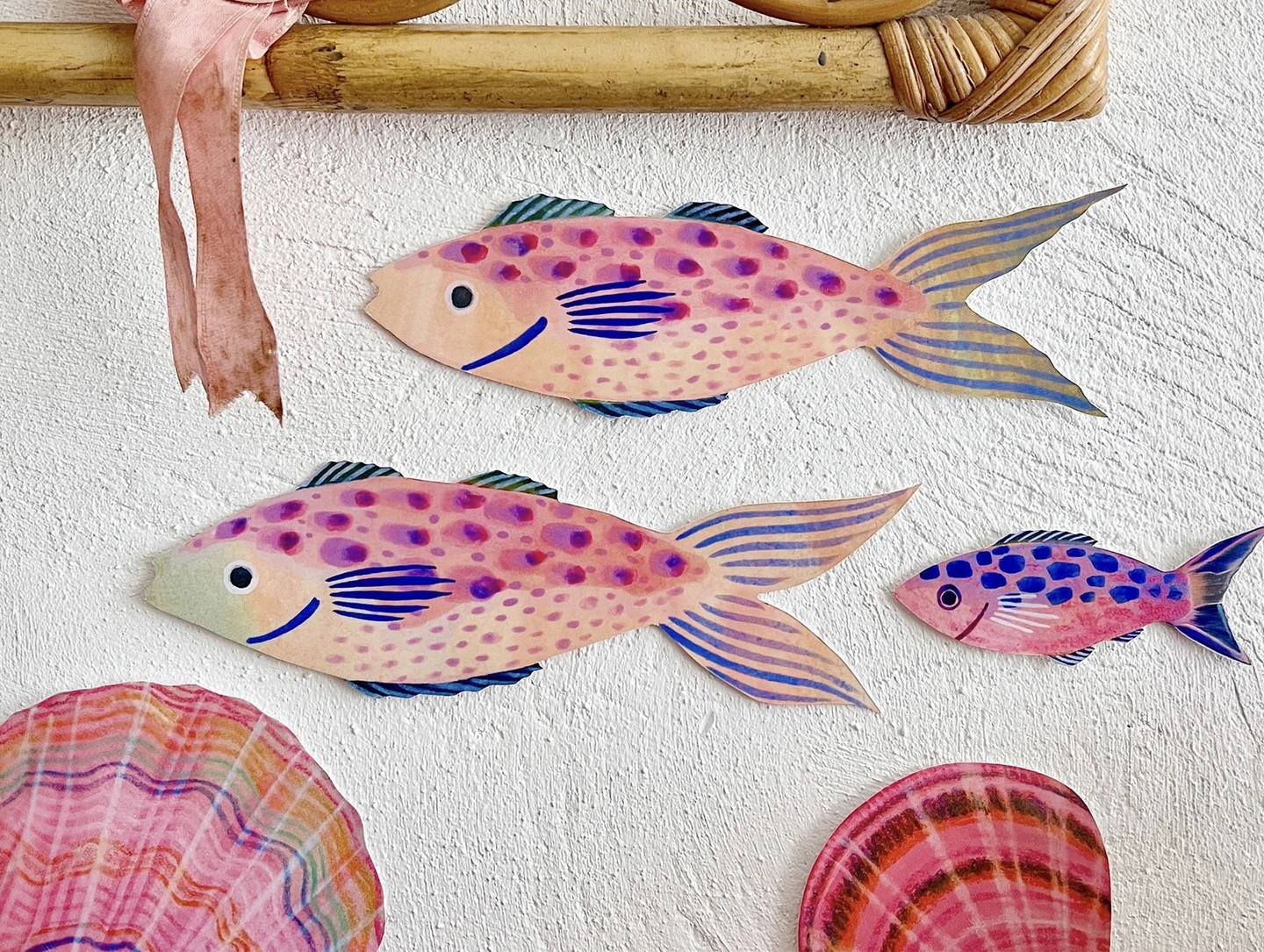 Painted fish wooden wall decorations in a kids' room