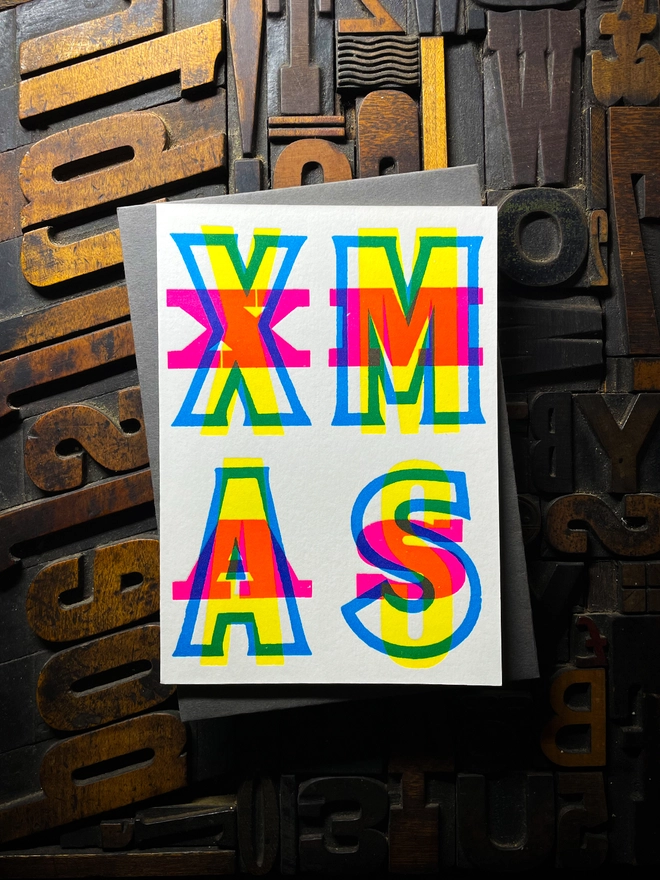 Festive Christmas typographic letterpress card with deep impression print. Very colourful and vibrant. With Real Grey envelope.