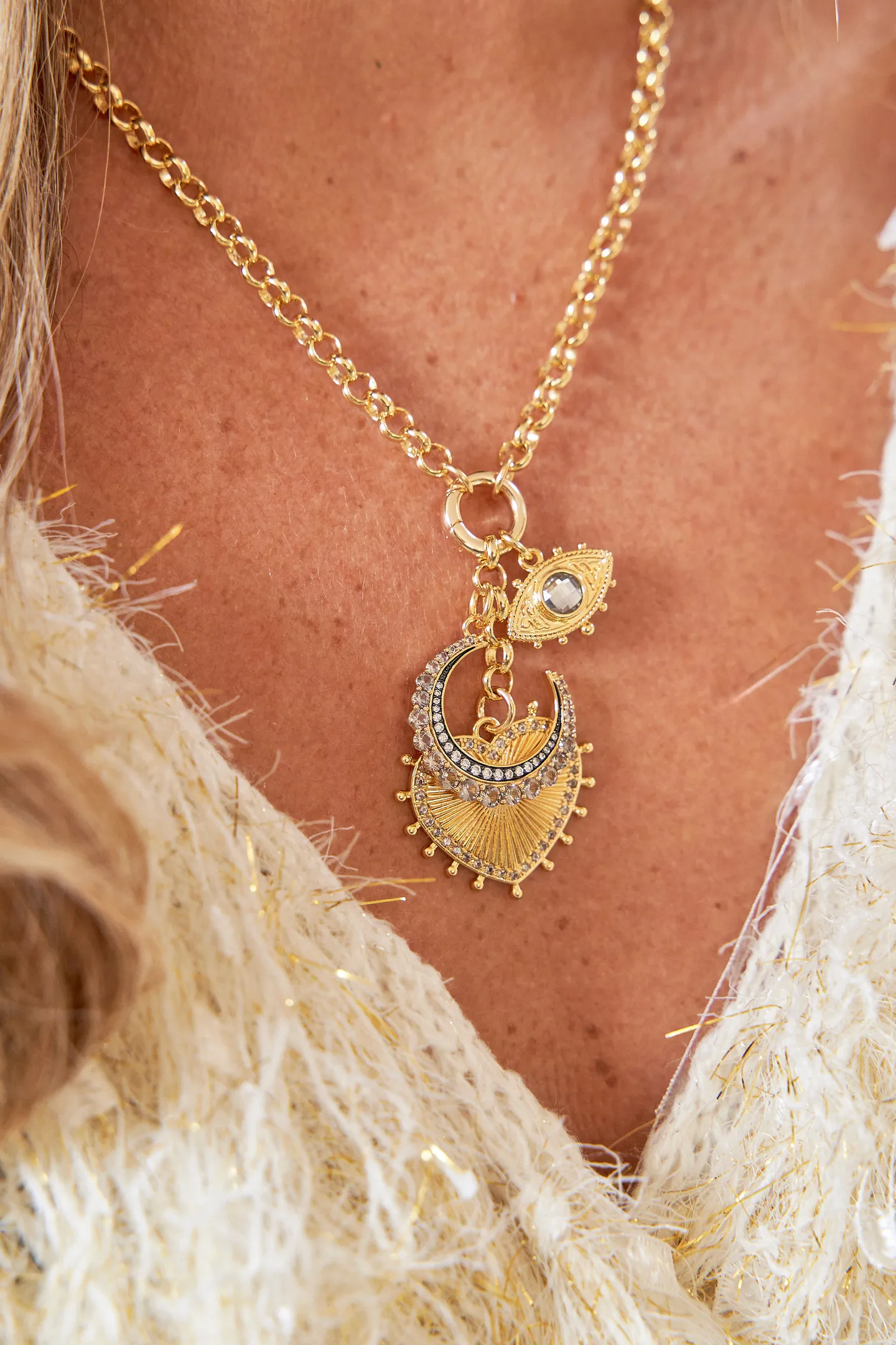 Sunburst heart charm necklace