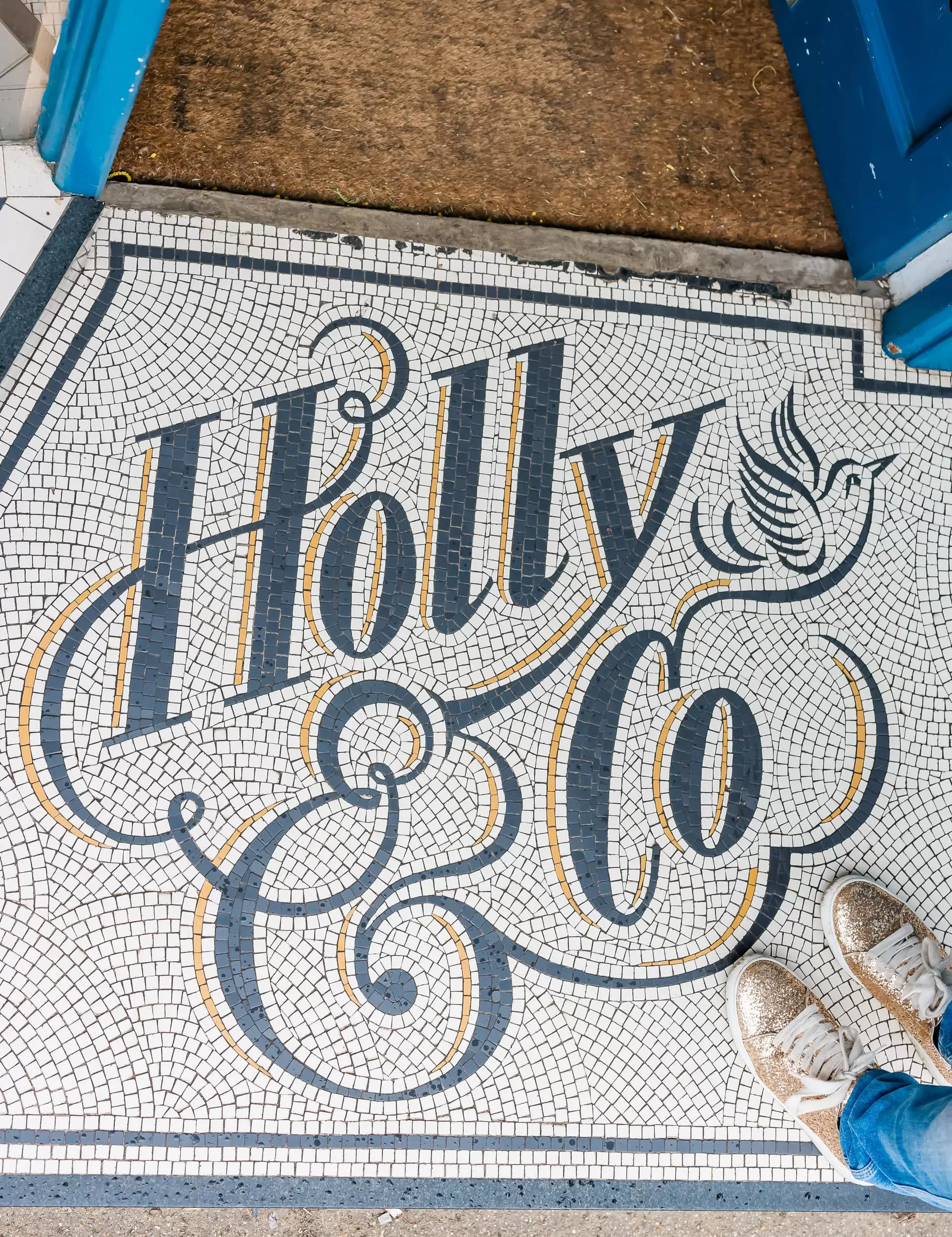 Holly & Co Logo in Mosaic Tile Art on doorway step