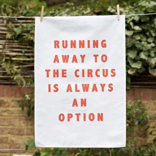 Running away to the circus is always a good idea tea towel
