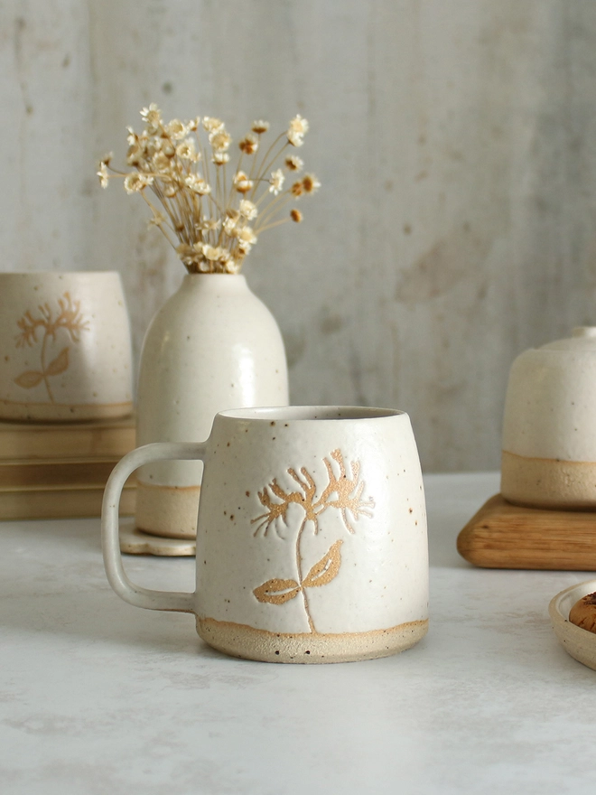 Honeysuckle white mug on table setting