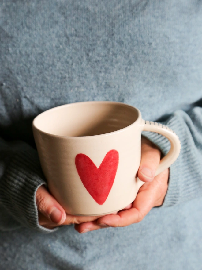 love you stoneware mug by laura lane ceramics