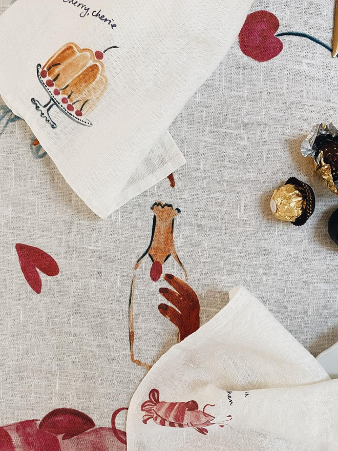 lobster couple dancing and cherry cake print linen napkins lifestyle shot