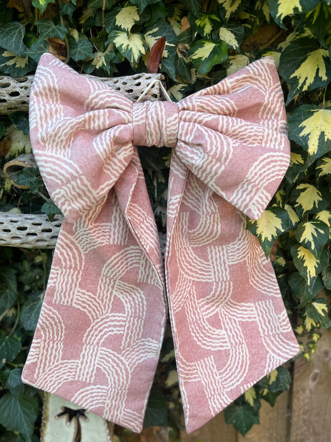 Large decorative bow made from remnant Fermoie Fontana fabric 