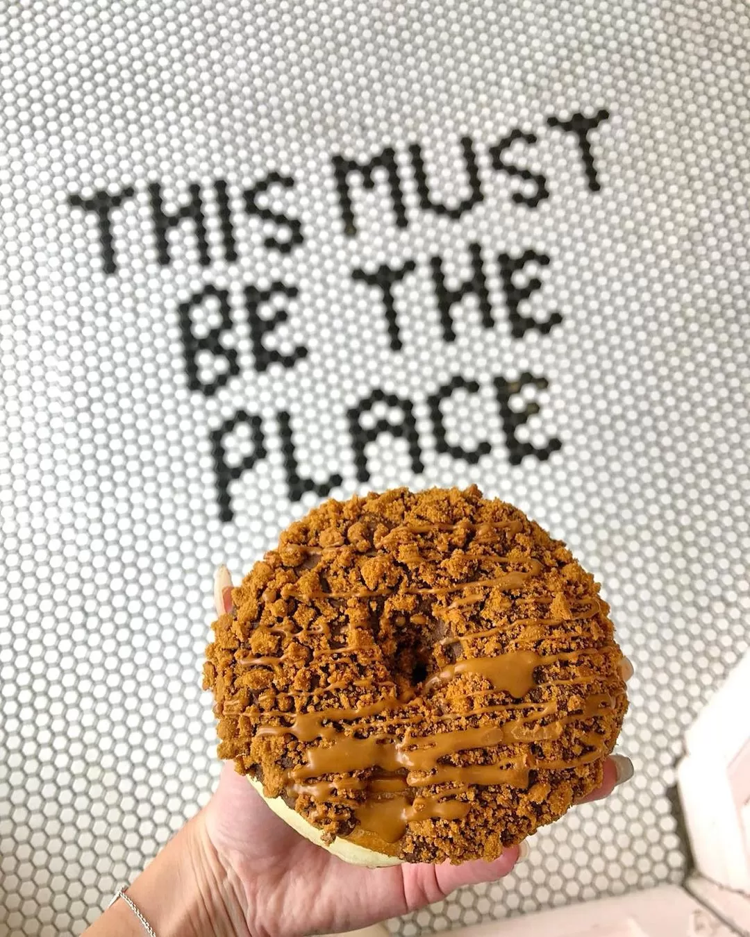 This must be the place tiled floor and donut