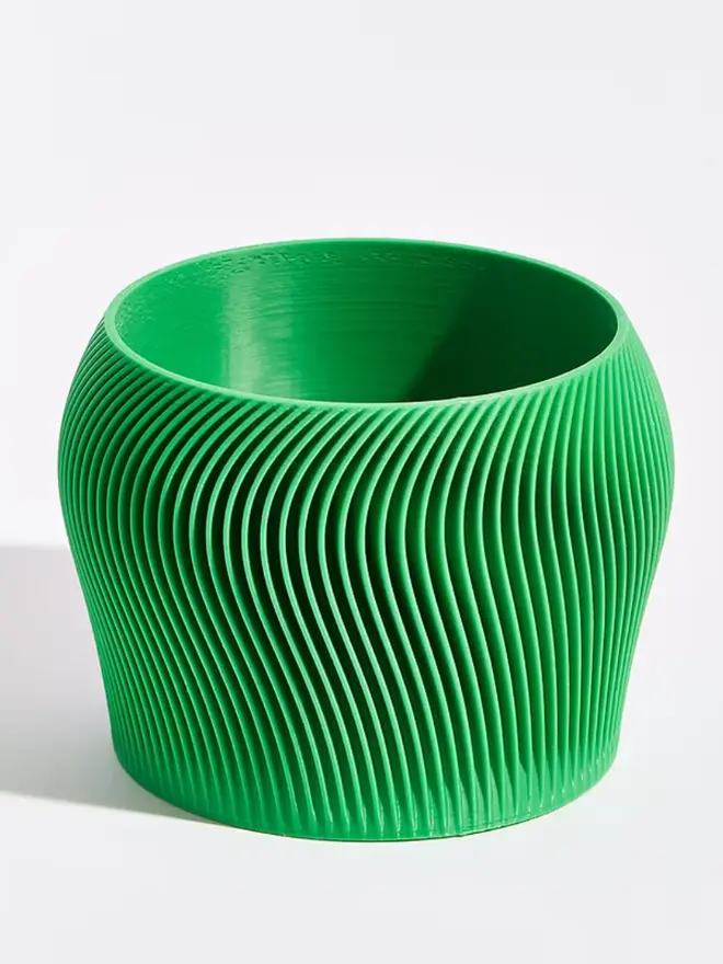 Sustainable 3D Printed Bamboo Green Plant Pot, orbital design against a white background. 