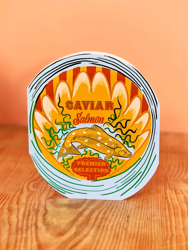 round shaped card with detailed salmon caviar design
