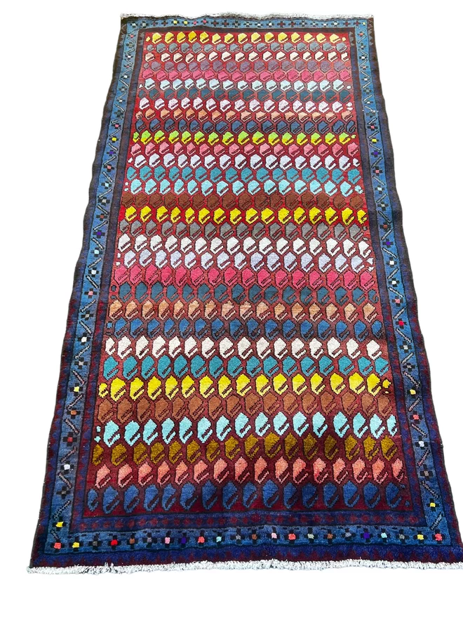 Bright hand knotted colourful soft cotton vintage rug with nearly neon pattern