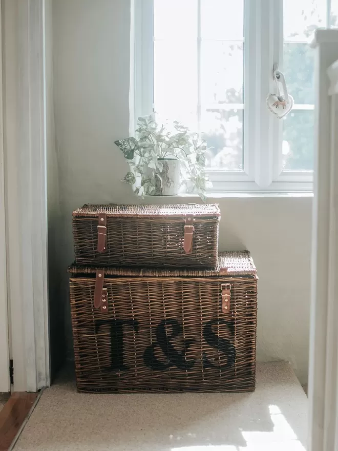Two sizes of the wicker hamper