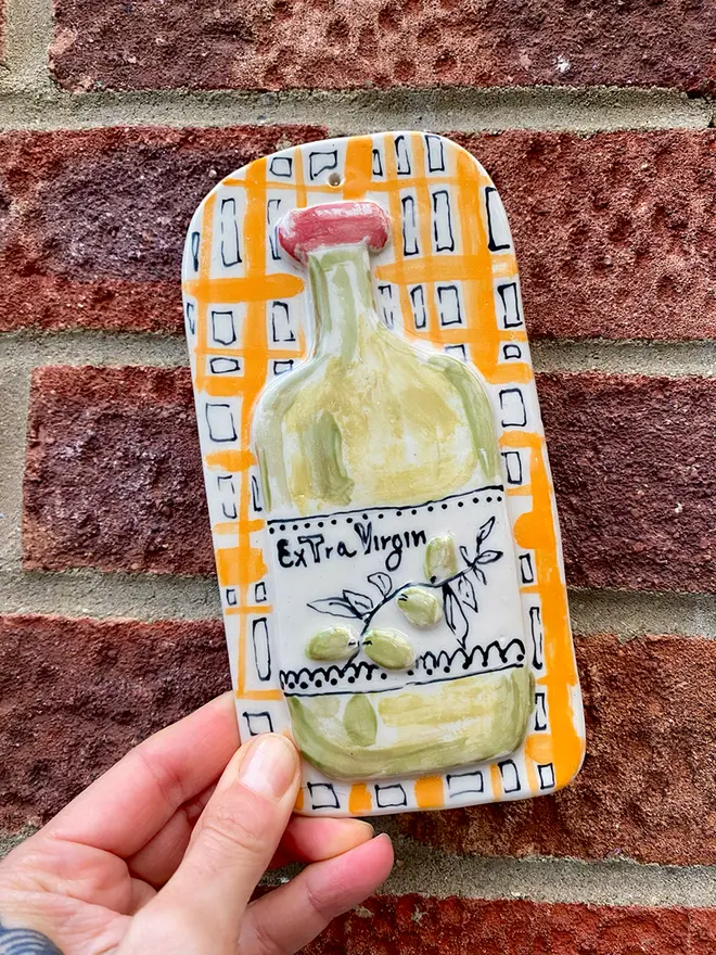 Olive oil wall hanging