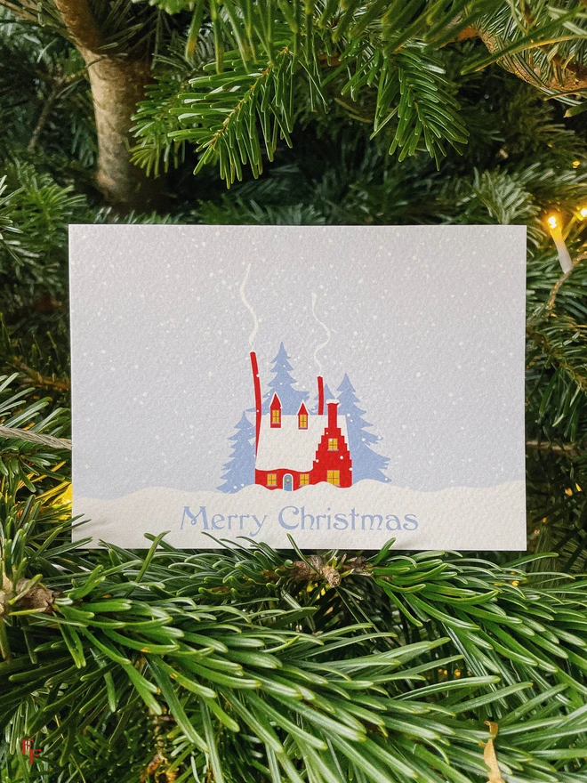 cosy christmas cabin 'merry christmas' charity christmas card, blue and red, illustrated cabin, vintage aesthetic, flora fricker