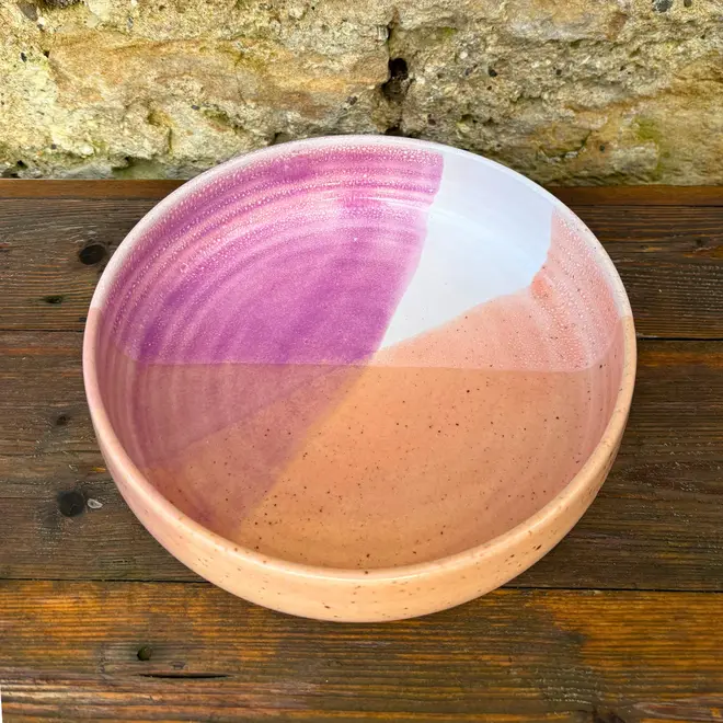 Ice Cream Sundae Pasta Bowl, a colourful pasta bowl sitting on a wooden surface against a brick backdrop. 
