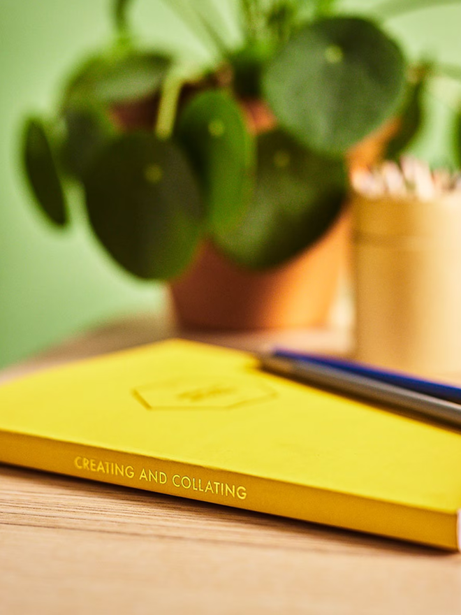 personalised gold foil a5 notebook. a yellow notebook with gold personalisation.