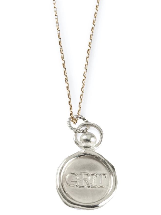 Grit Charm in silver on chain 