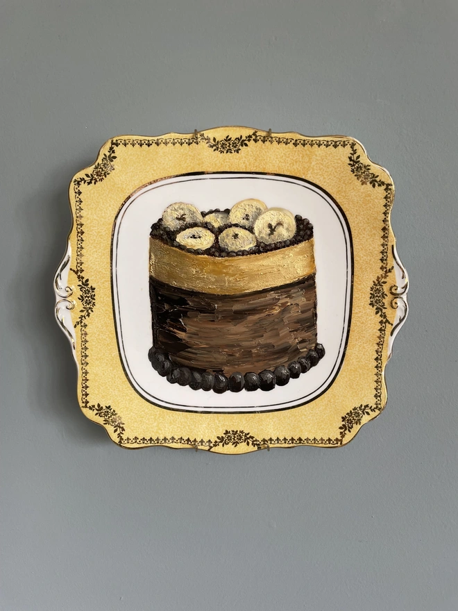banana gateau painting on plate