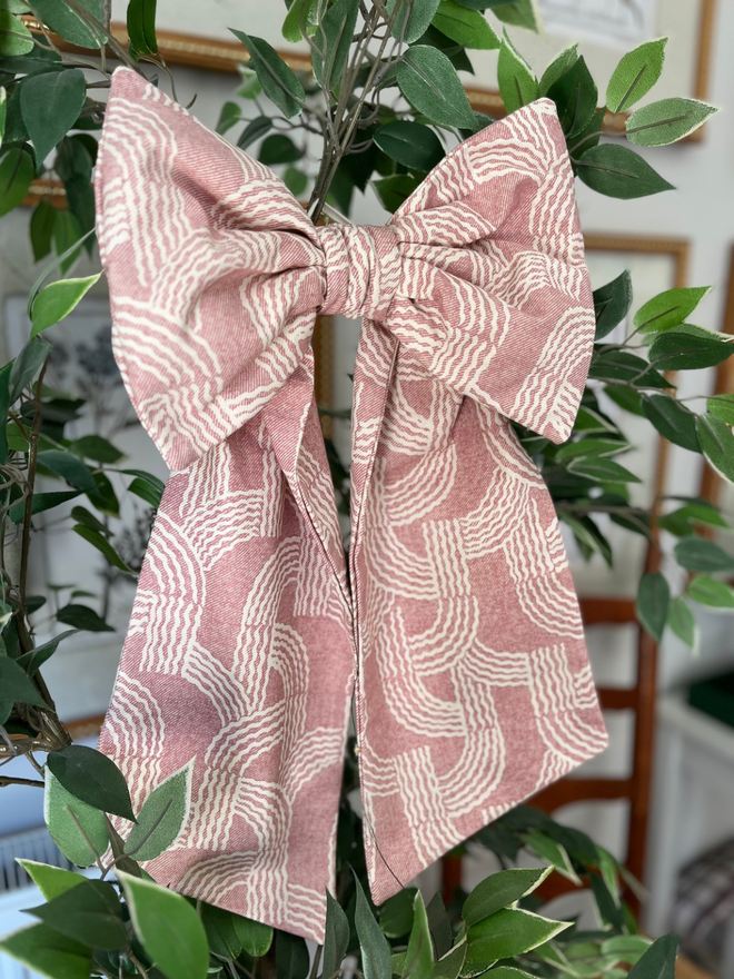 Large decorative bow made from remnant Fermoie Fontana fabric 