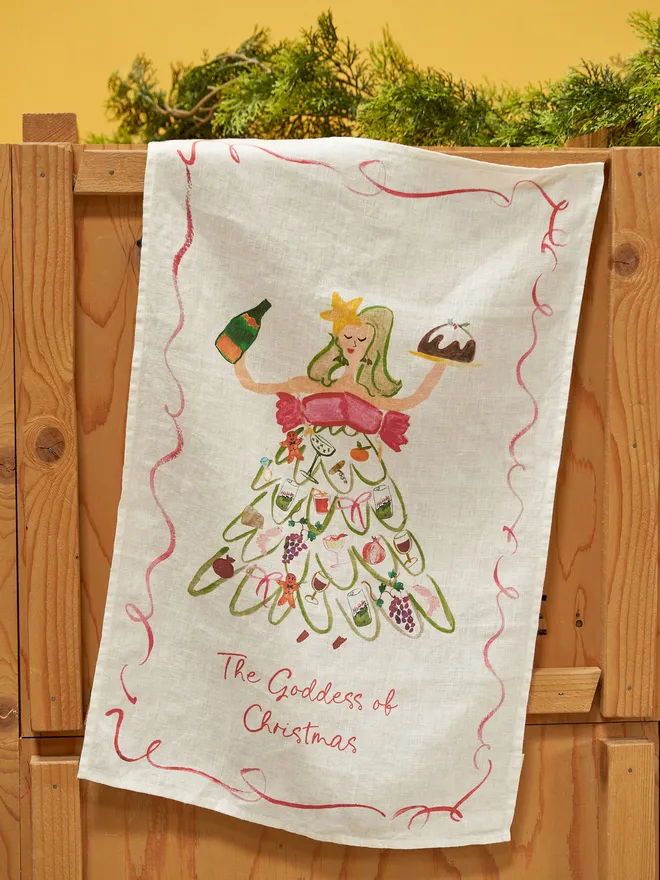 The goddess of Christmas linen tea towel