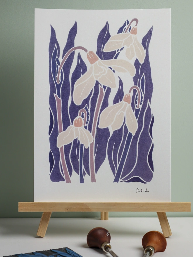 Linocut winter snowdrops in the night garden, an A4 art print printed in the UK on cotton paper