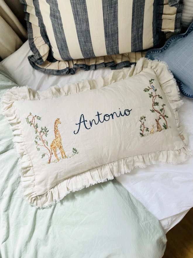 Soft Linen personalised cushion with giraffe and bunny motif - blossom and bramble embroidery